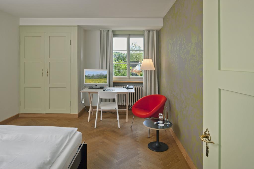 Boutique-Hotel Auberge Langenthal Pokoj fotografie