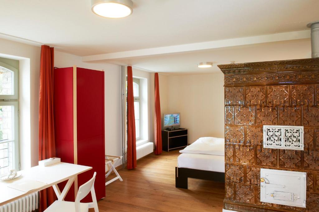 Boutique-Hotel Auberge Langenthal Pokoj fotografie